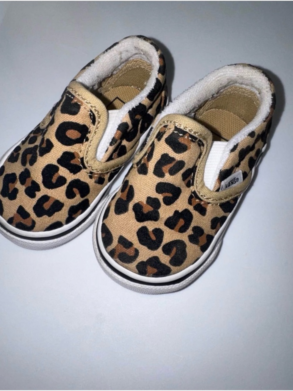 Vans Kids Slip-On Sneakers in Tan and Black Leopard Print